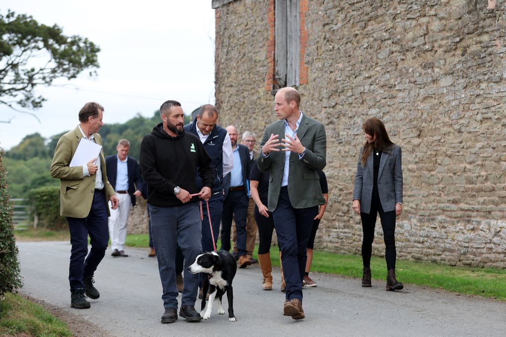Prince William talking to Sam Stables during their visit to Kings Pitt Farm