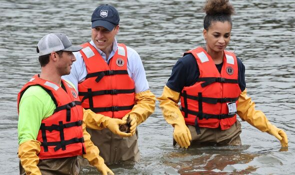 Prince William looked at home wading in the waters of the East River.