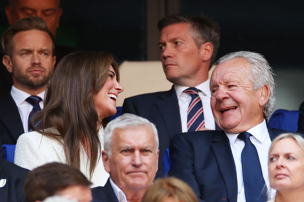 Catherine, Princess of Wales and Patron of the England Rugby Football Union (RFU) laughing with  Sir Bill Beaumont CBE, Chairperson of World Rugby
