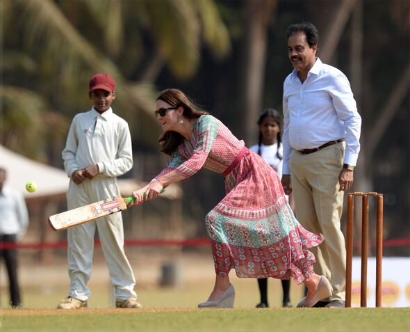 Kate playing cricket 