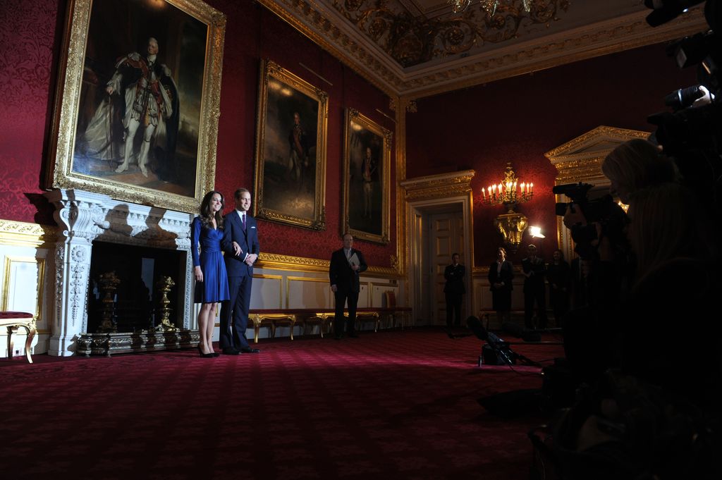 Prince William and Kate Middleton pose for photographers during a photocall to mark their engagement