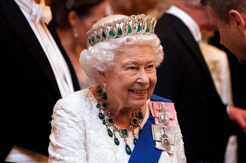 The Queen wearing the The Grand Duchess Vladimir Tiara with emeralds