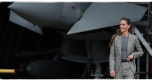 Kate Middleton in a sleek grey trouser suit during her first official visit to RAF Coningsby
