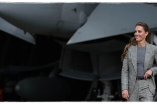 Kate Middleton in a sleek grey trouser suit during her first official visit to RAF Coningsby