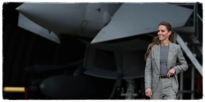 Kate Middleton in a sleek grey trouser suit during her first official visit to RAF Coningsby