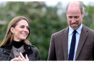 Prince William and Kate Middleton smiling during a ski holiday as they win a legal case over published photos