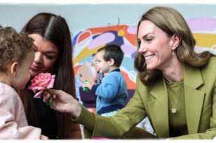 Princess Kate smiling and laughing during a surprise public outing showing her playful side