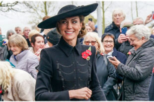 Princess Kate smiling warmly while greeting a fan who was left shaking after their royal interaction