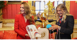Kate Middleton wearing a red power suit during her first solo royal engagement of 2026